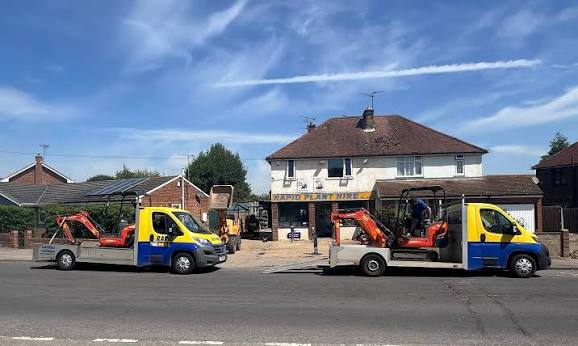 Rapid Plant vans loaded with mini diggers outside our Vicarage Road yard, Sittingbourne